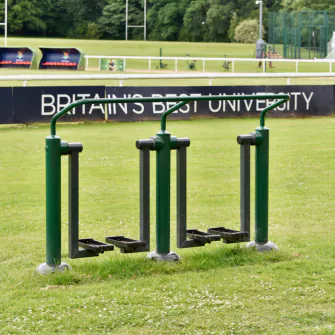Double walker for outdoor gym, similar to an outdoor treadmill.
