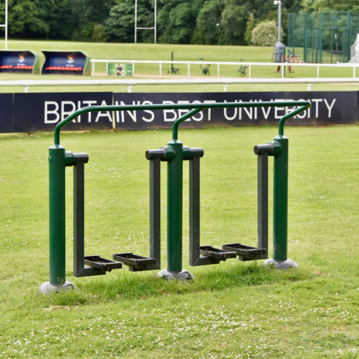 Double walker for outdoor gym, similar to an outdoor treadmill.